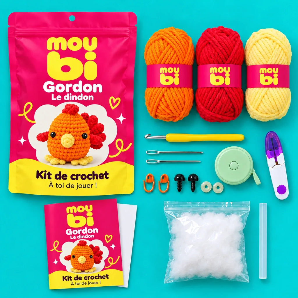 Contenu du kit de crochet Gordon, le dindon : fils, crochet, accessoires, sachet et livret Moubi.