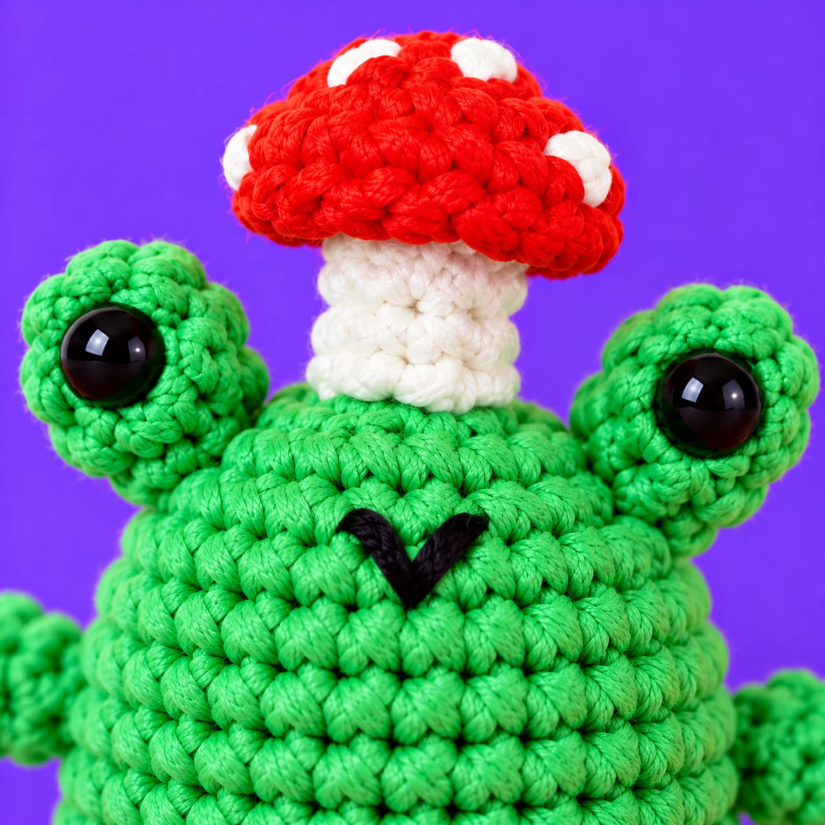 Zoé — Grenouille avec champignon au crochet — détail des mailles.