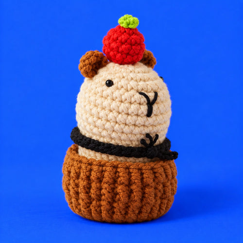 Armand — Le petit gourmand au crochet — vue de trois quarts.
