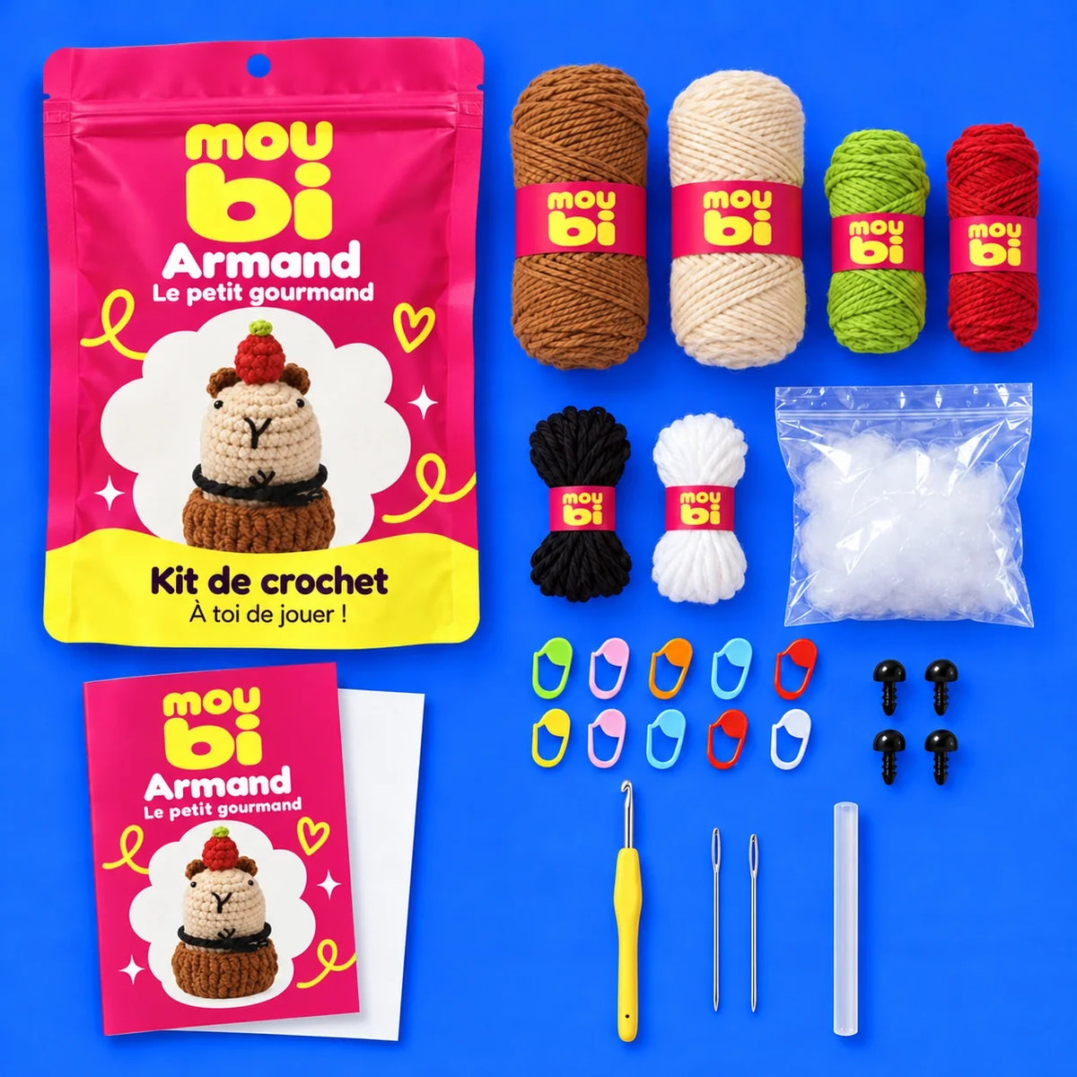 Contenu du kit de crochet Armand, le petit gourmand : fils, crochet, accessoires, sachet et livret Moubi.